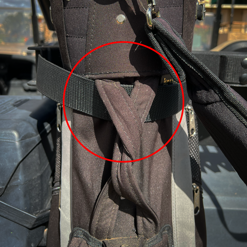 Clubs attached properly to a golf cart