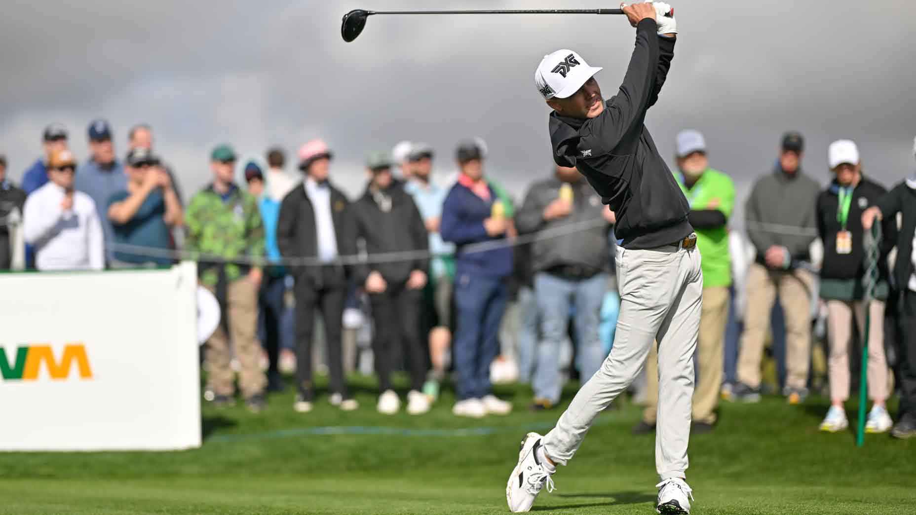 eric cole hits a tee shot during the 2024 waste management phoenix open