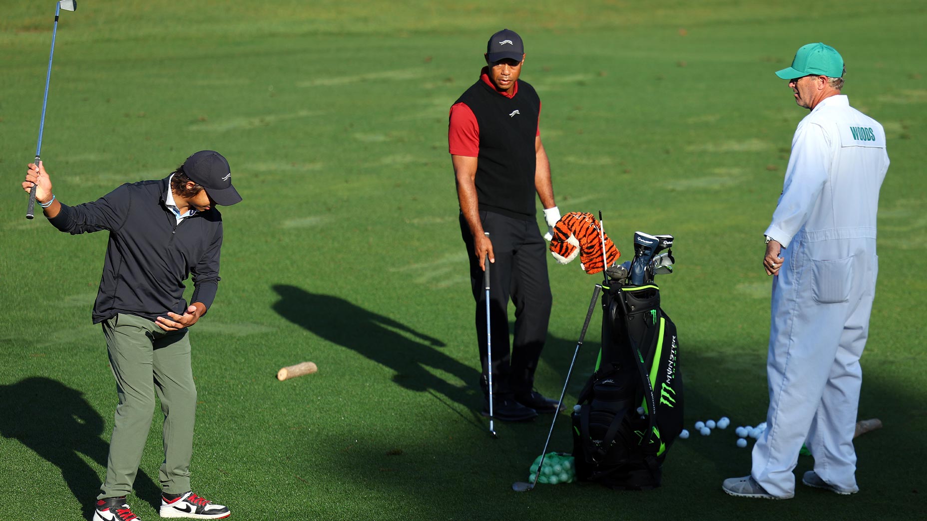 tiger woods and charlie woods practice swing together at Masters Sunday