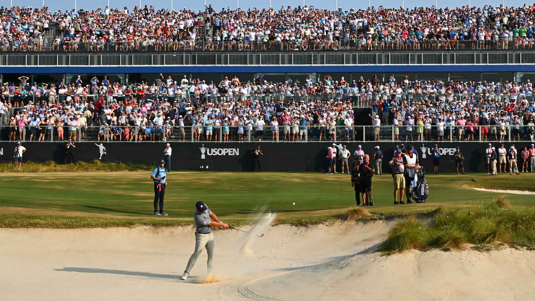 Bryson DeChambeau hits a shot from the bunker at the 18th hole during the final round of 124th U.S. Open Championship at Pinehurst No. 2 at Pinehurst Resort on June 16, 2024 in Pinehurst, North Carolina.