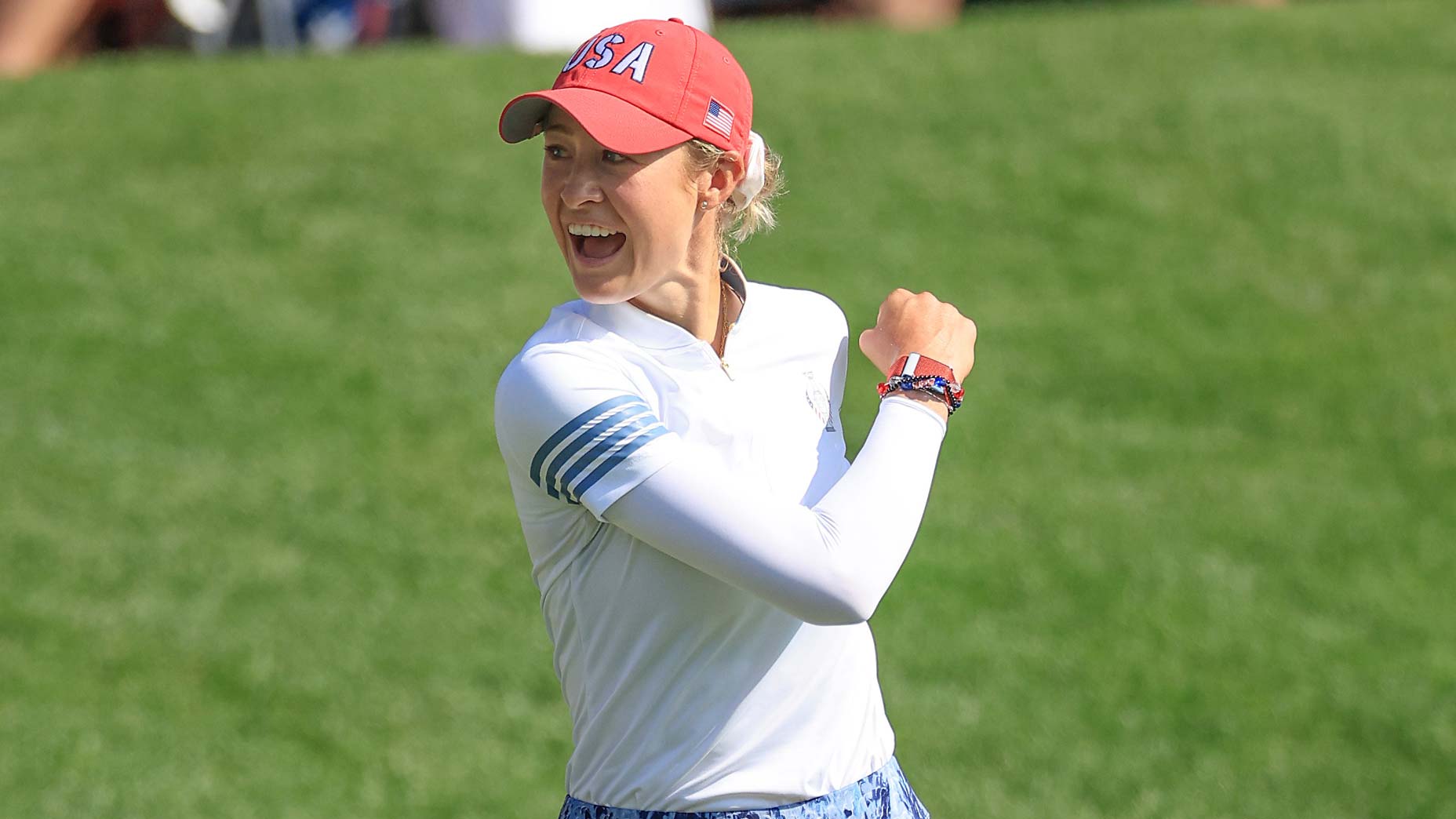 LPGA star Nelly Korda celebrates holing a putt for a winning eagle at the 14th hole in her match with Allisen Corpuz against Carlota Ciganda and Emily Pedersen of The European Team during the Saturday morning foursomes matches of the 2024 Solheim Cup at The Robert Trent Jones Golf Club.