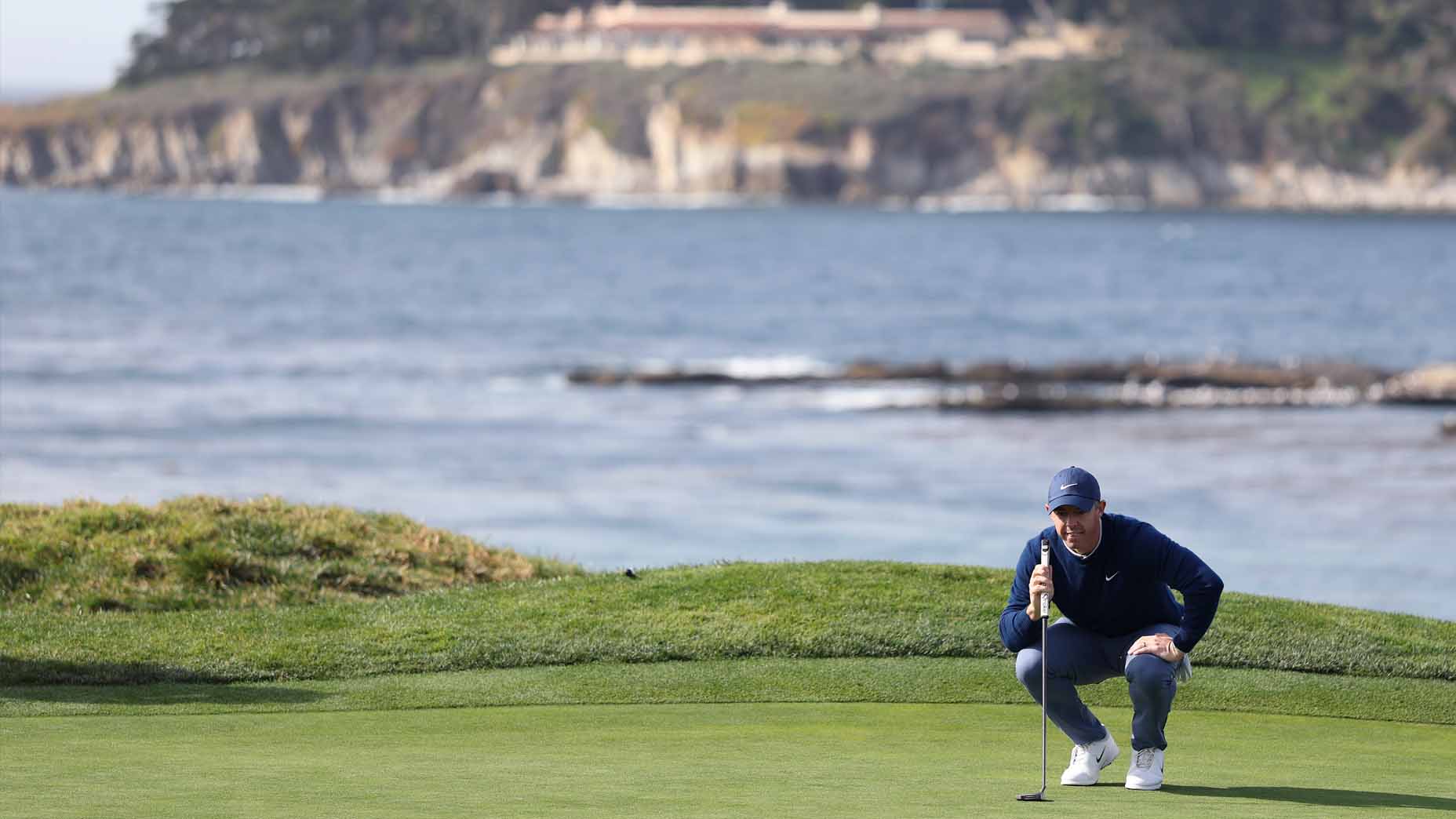 Rory McIlroy reads a green during the final round of the AT&T Pebble Beach Pro-Am