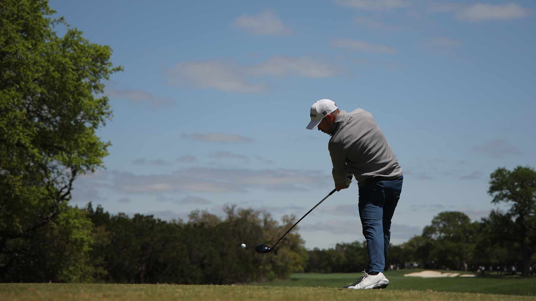 Brian Harman plays a tee shot at the Valero Texas Open.