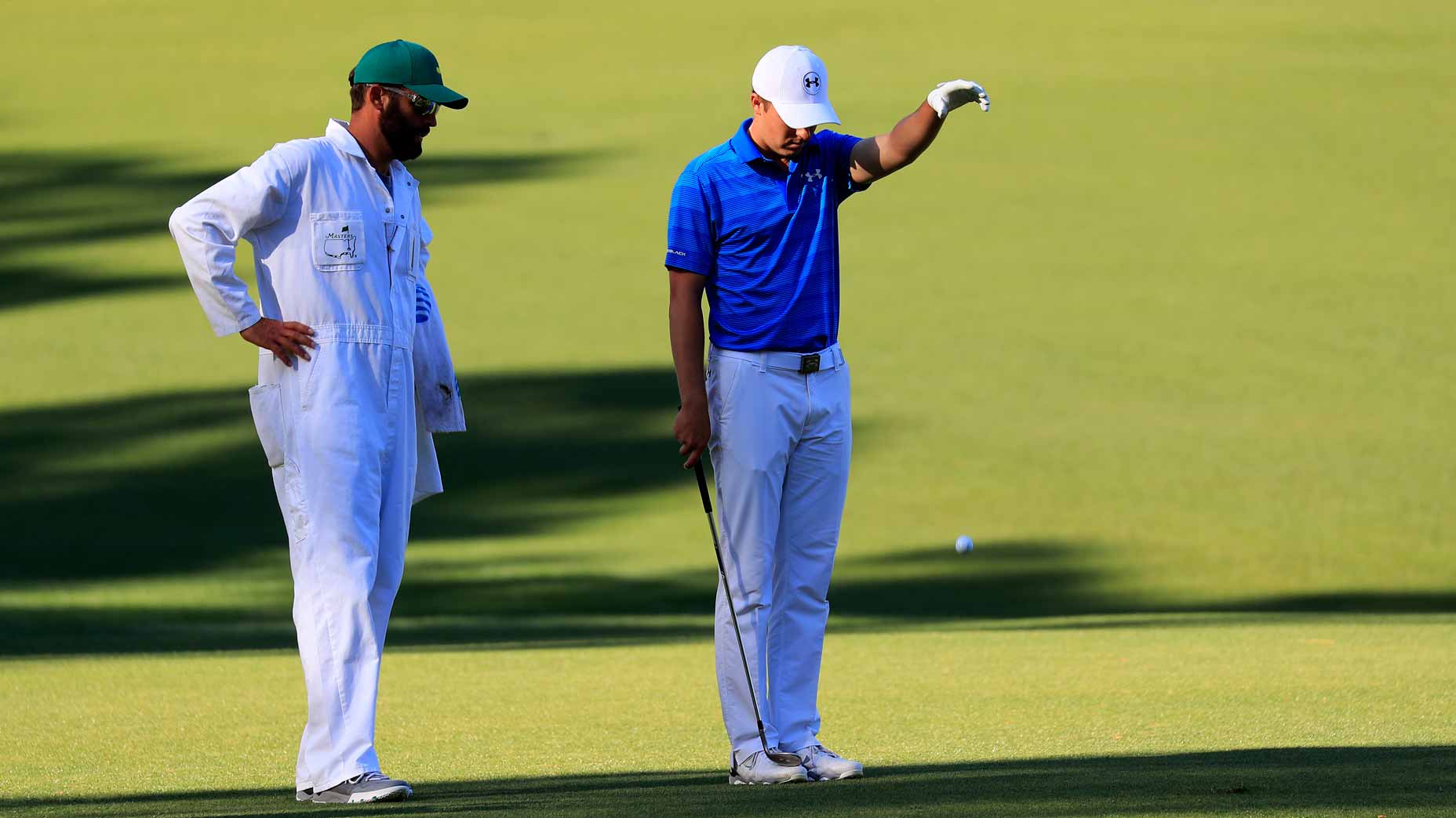 Jordan Spieth takes a drop during the 2016 Masters.