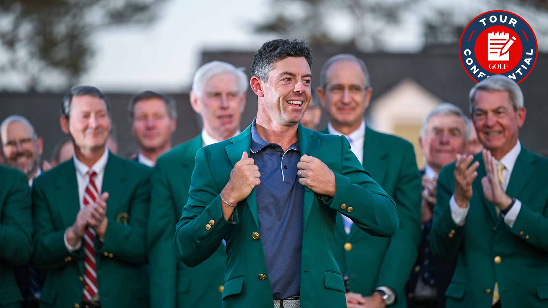 Rory McIlroy smiles after getting the green jacket.
