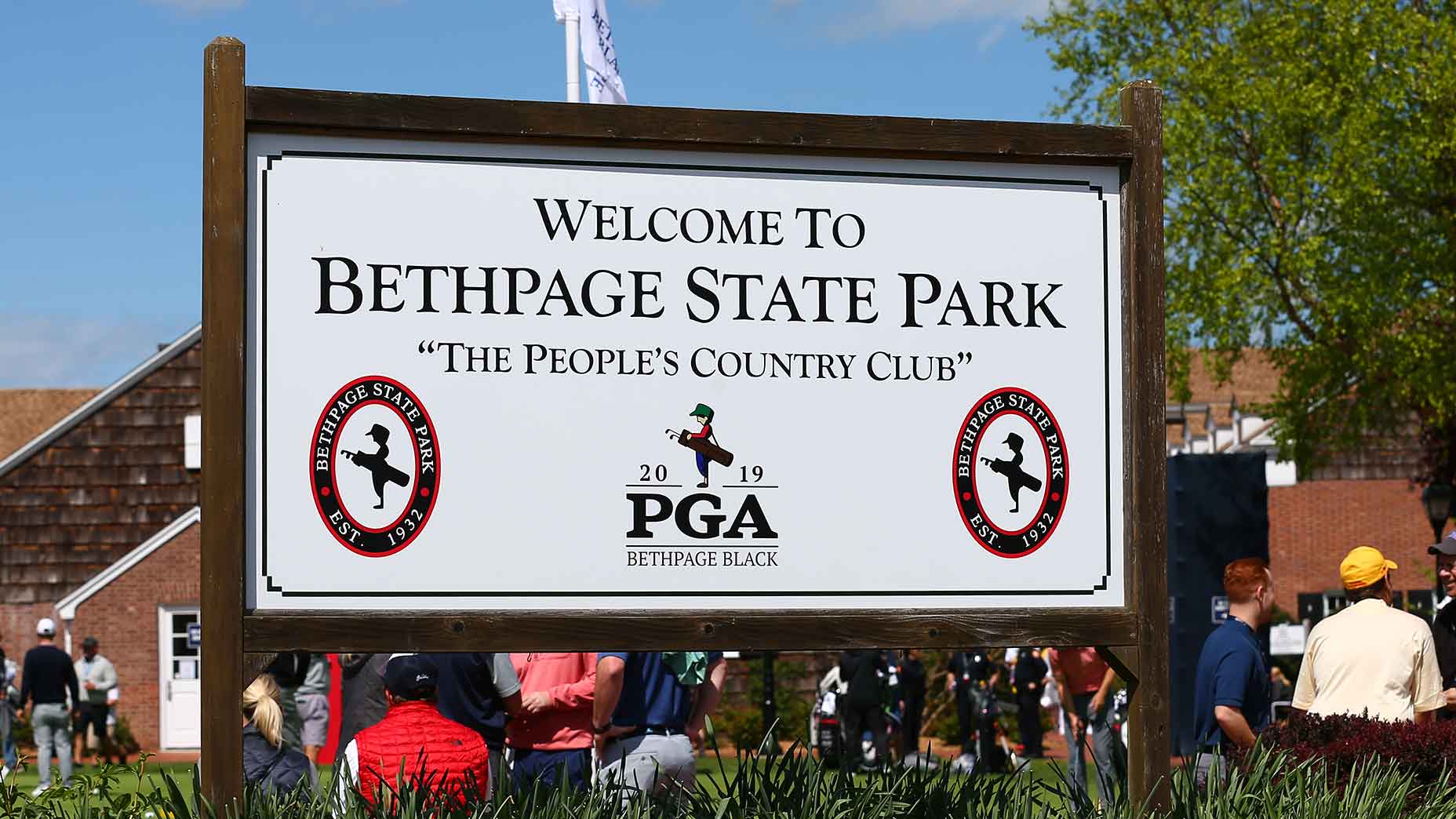 a photo of the bethpage state park sign with 'the people's country club' in writing