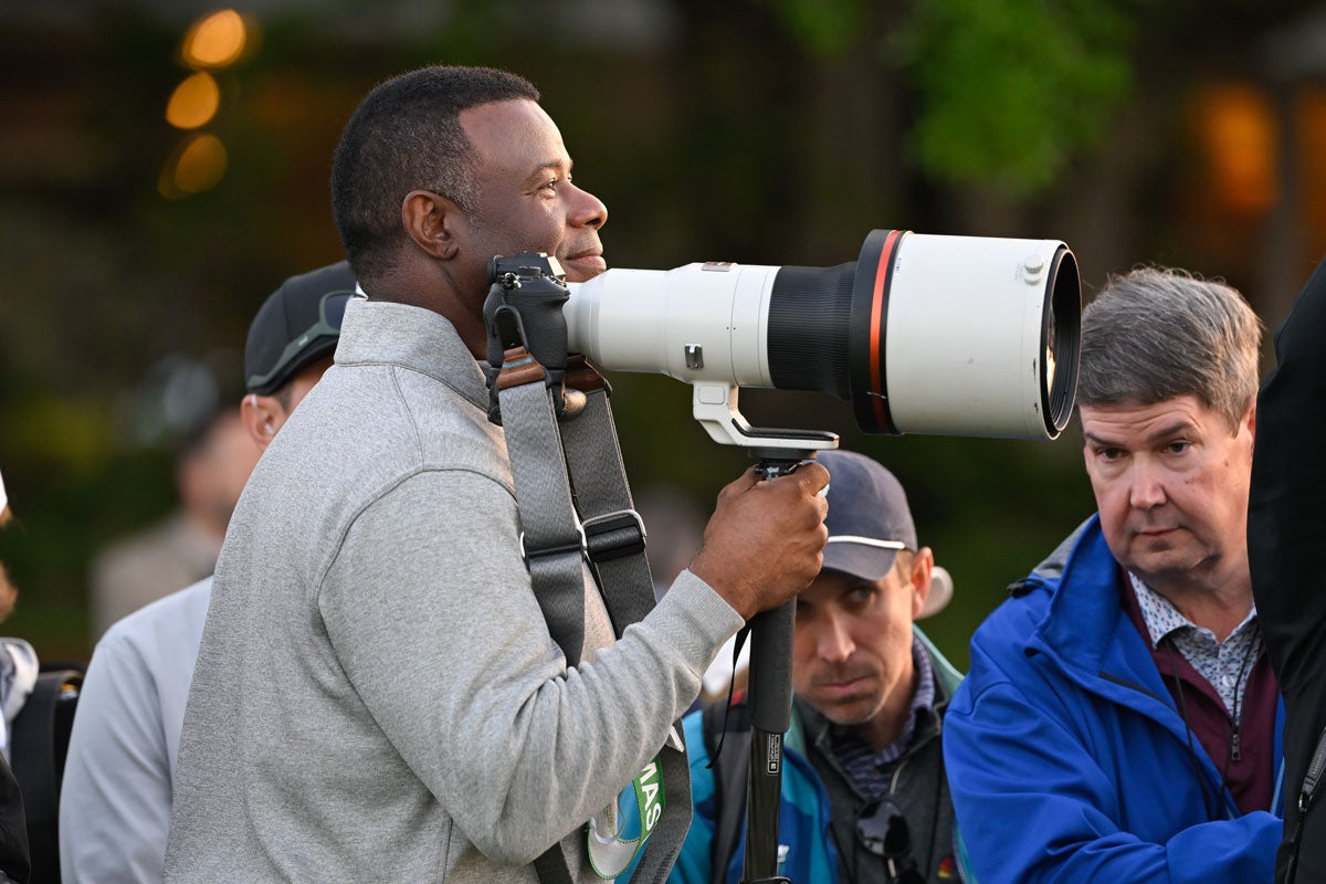 Ken Griffey Jr. taking photos at the Masters