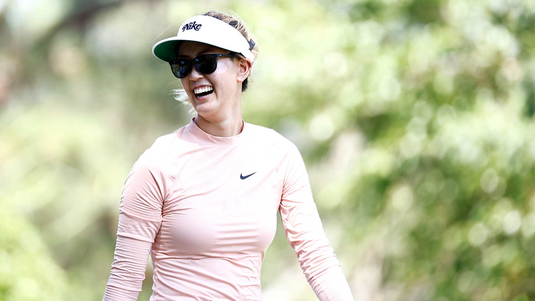 Michelle Wie West walks down the fairway during the first round of the 2022 U.S. Women's Open in Southern Pines, N.C.