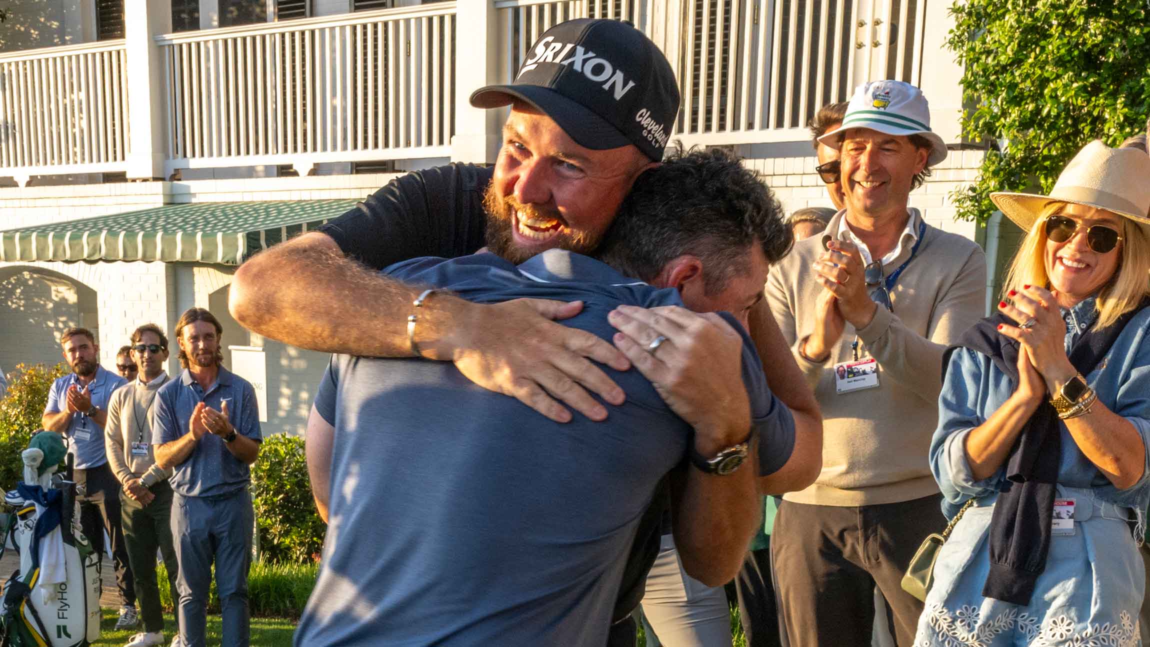 Masters champion Rory McIlroy of Northern Ireland celebrates with Shane Lowry of Ireland after winning the Masters in a sudden death playoff at Augusta National