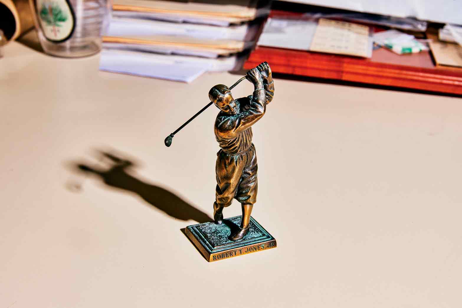A miniature statue of Bobby Jones, who completed his 1930 Grand Slam at the U.S. Am at Merion.