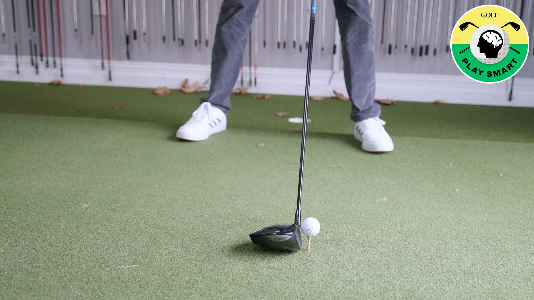 golf club with golf ball teed up