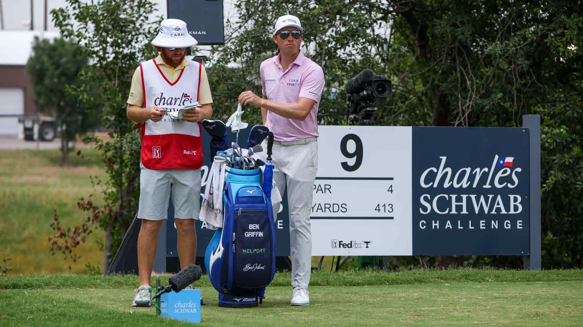 Ben Griffin (USA) selects a club for the 9th hole during the third round of the Charles Schwab Challenge on May 24, 2025 at Colonial Country Club in Fort Worth, TX.