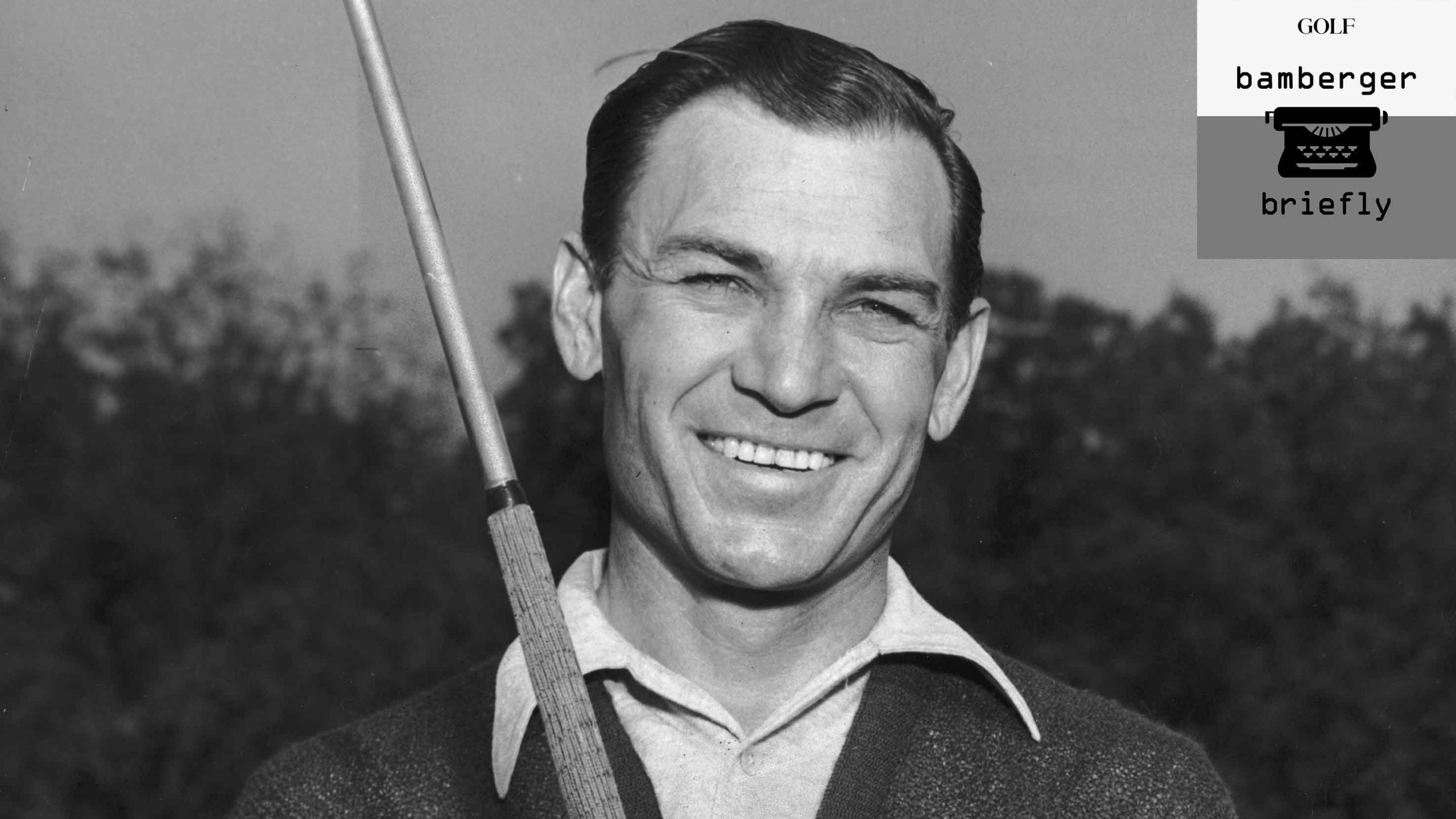 circa 1948: Golfer Ben Hogan (1912 - 1997) smiles while holding a golf club outdoors
