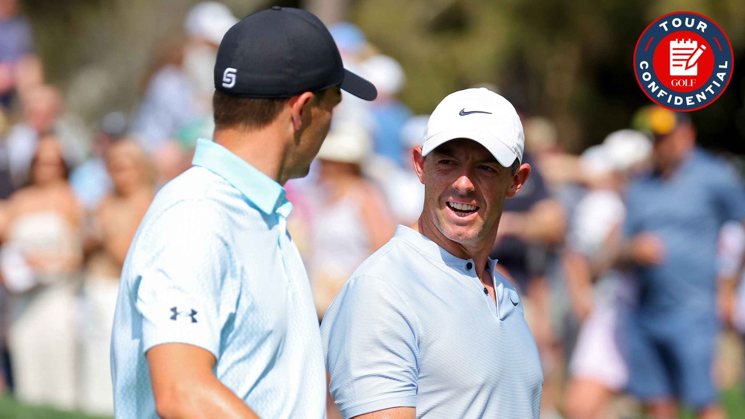 Jordan Spieth of the United States and Rory McIlroy of Northern Ireland walks off the seventh green during the second round of THE PLAYERS Championship