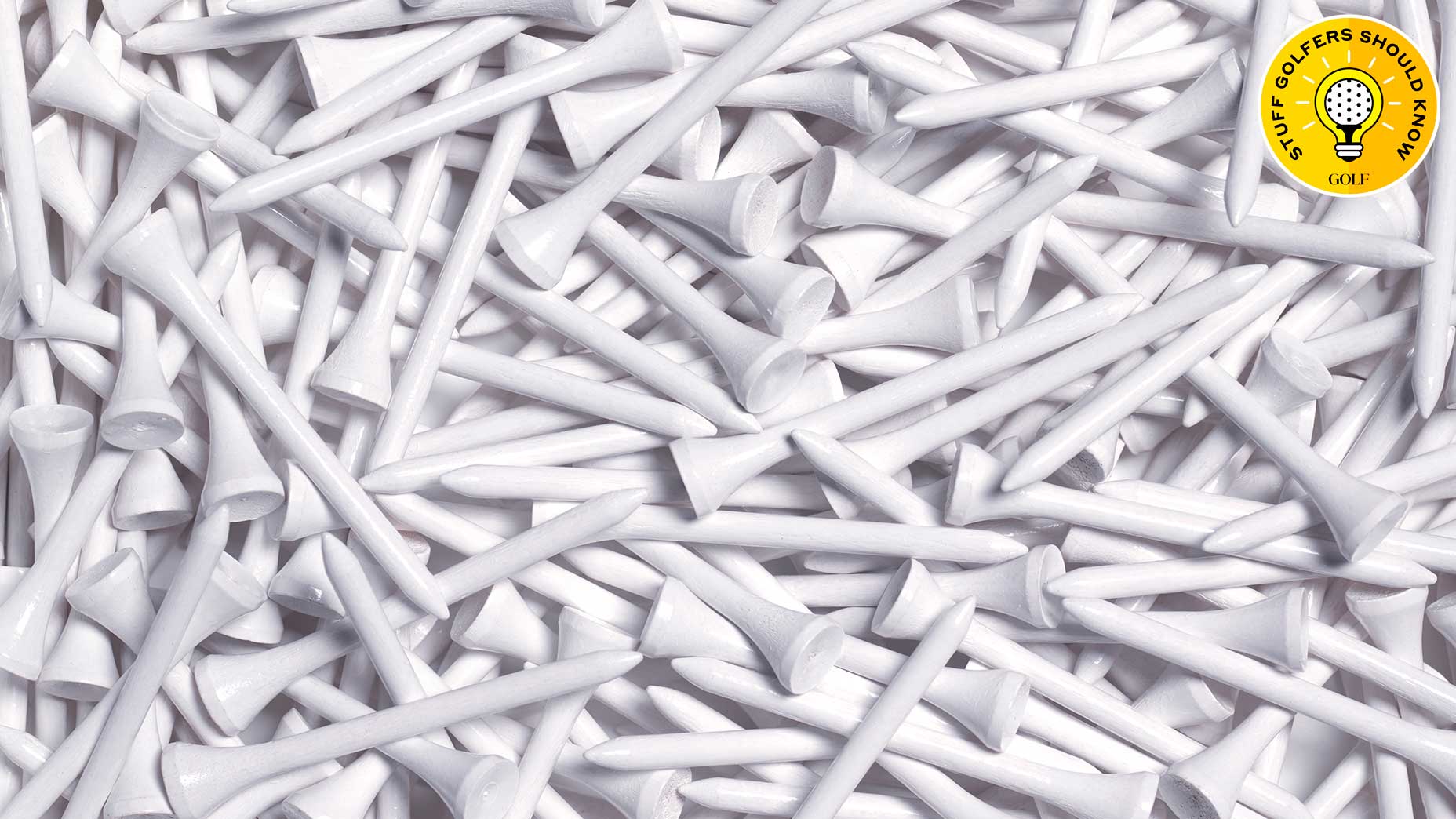 a collection of golf tees