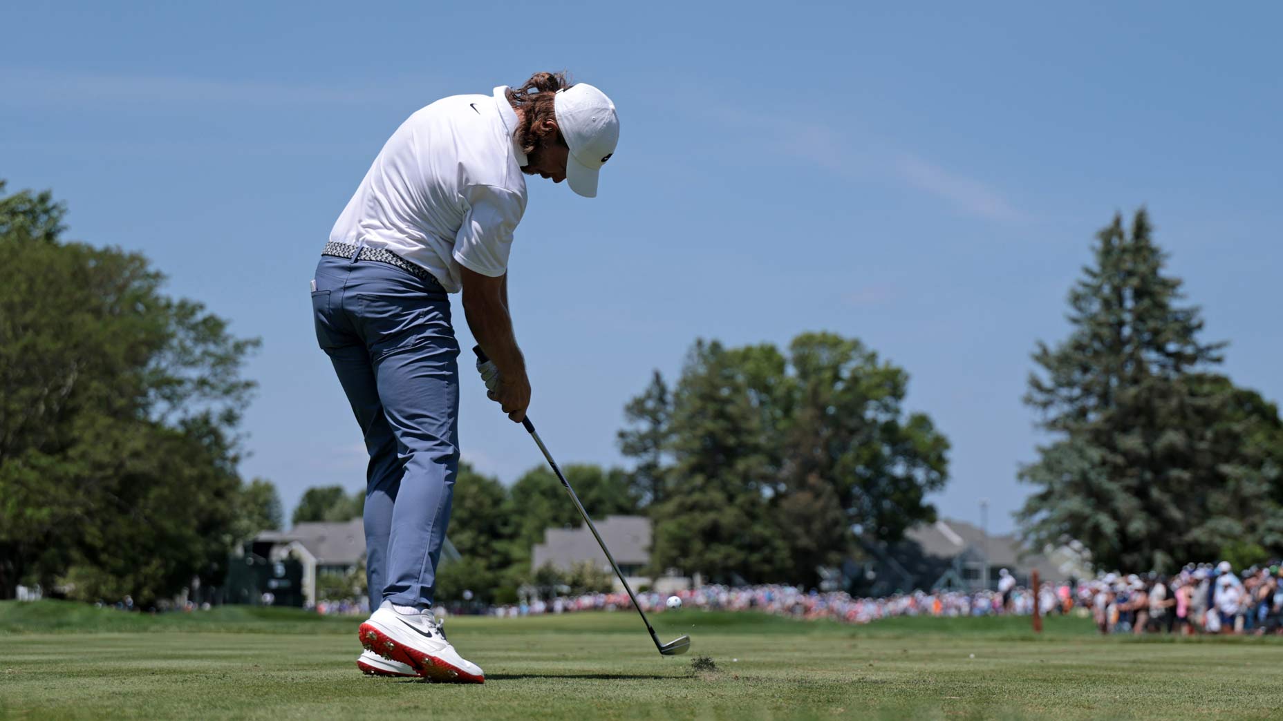 Tommy Fleetwood of England plays his shot from the fifth tee during the final round of the Travelers Championship 2025 at TPC River Highlands on June 22, 2025 in Cromwell, Connecticut.