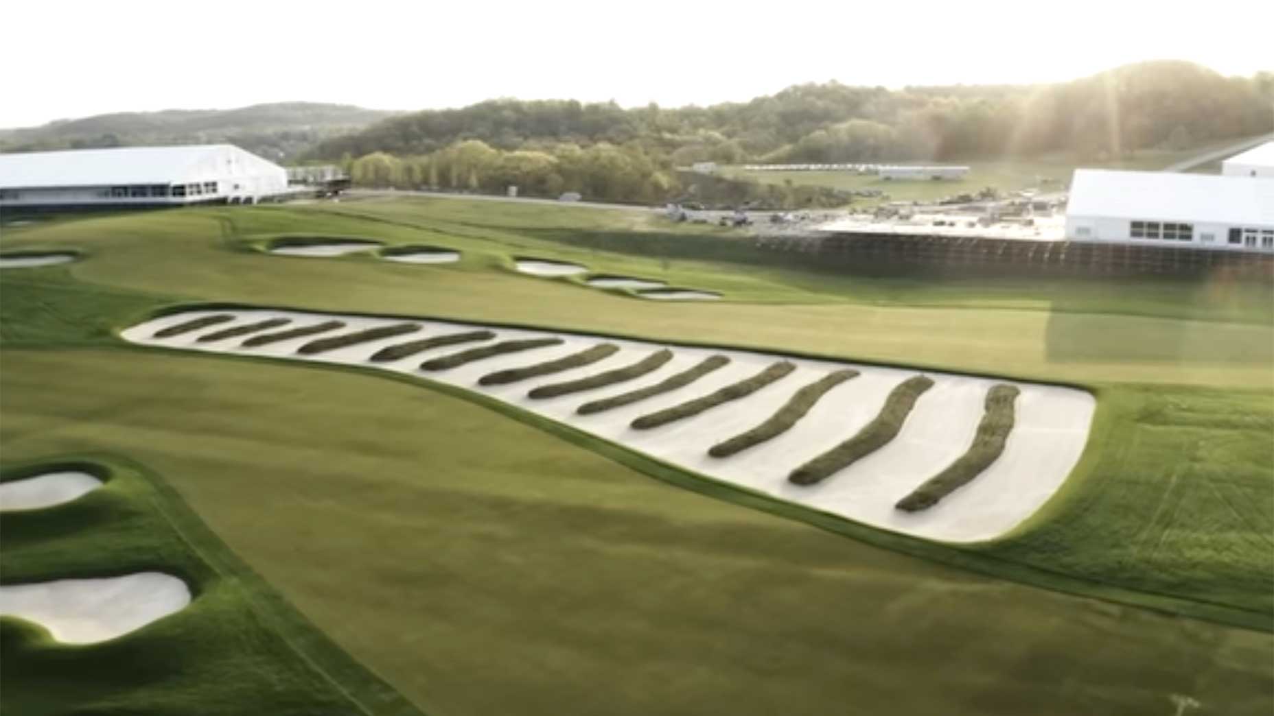 a view of oakmont's church pew bunker