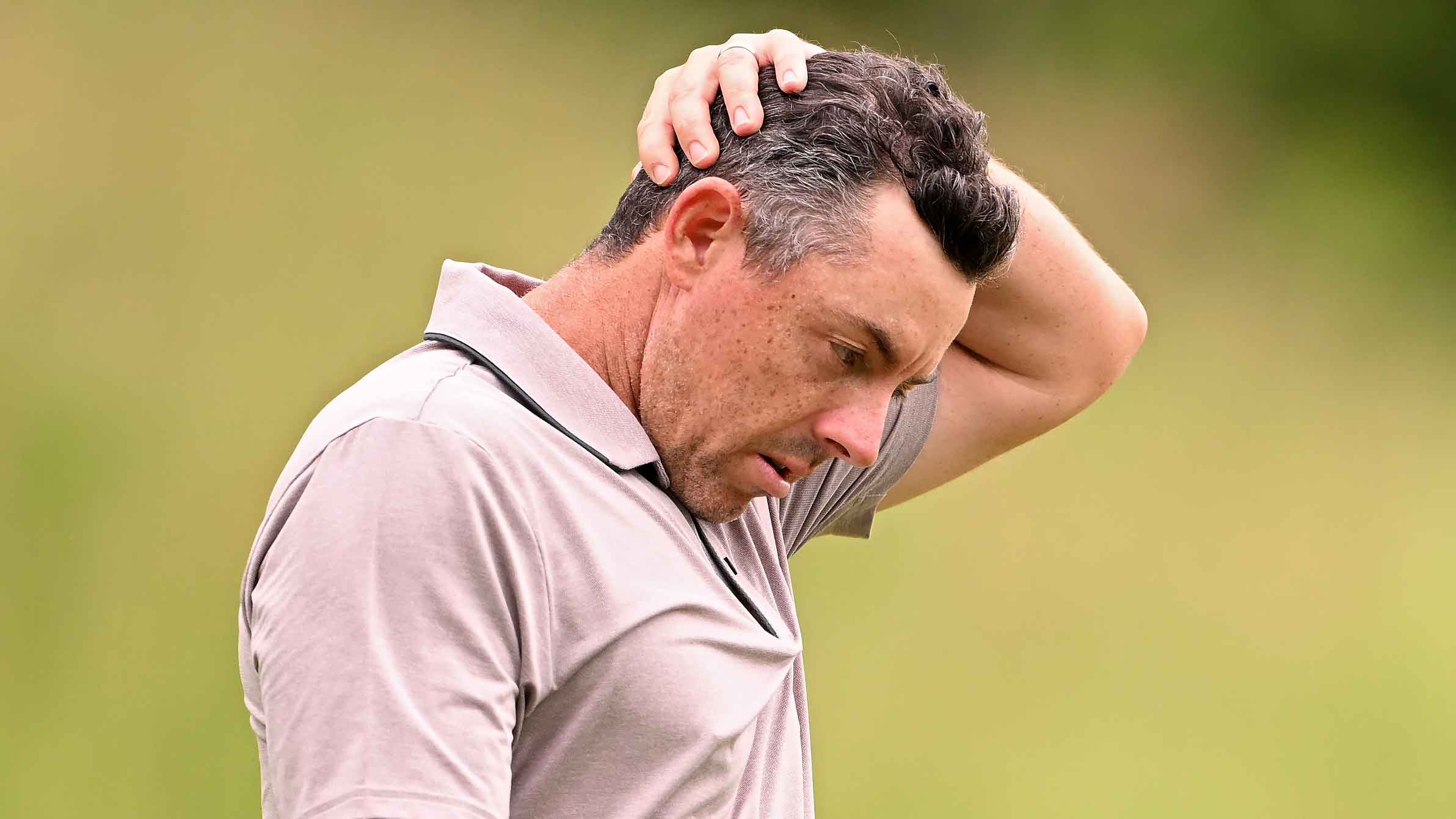 Rory McIlroy of Northern Ireland walks off the seventh tee during the third round of the 125th U.S. OPEN at Oakmont Country Club
