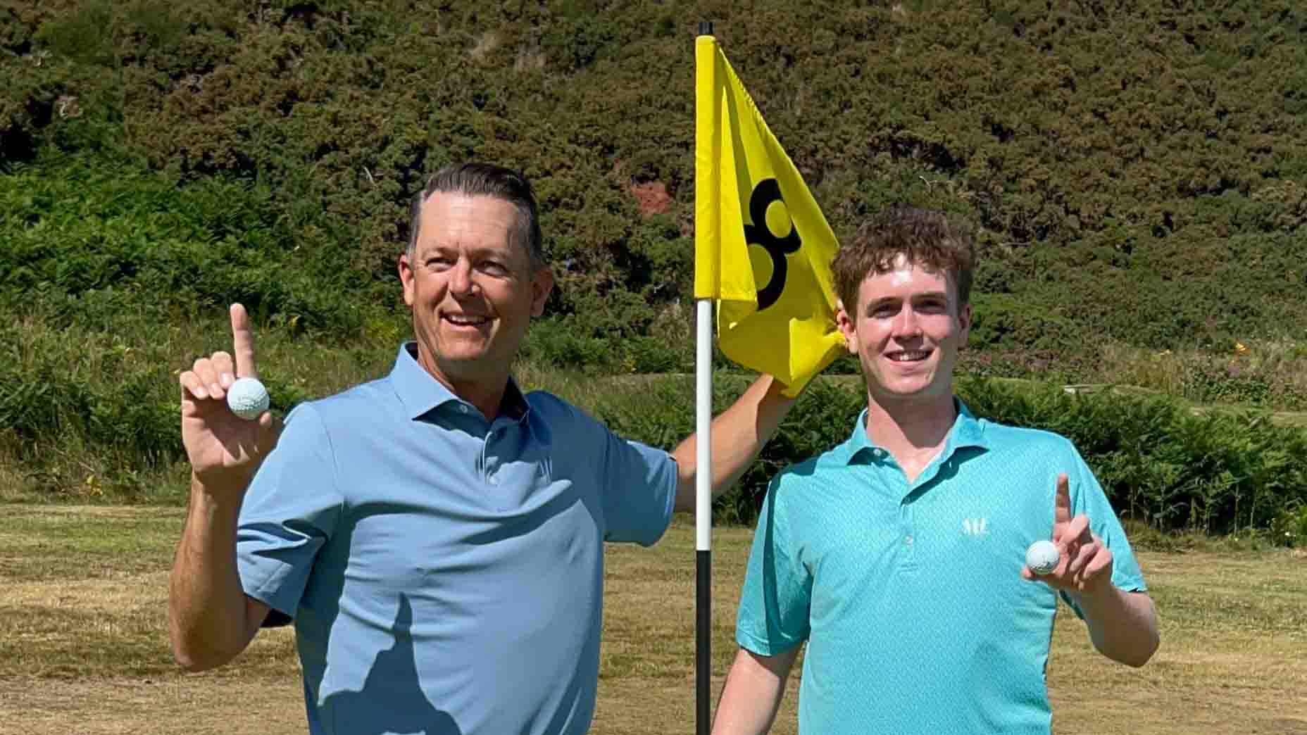 Jim Rohrstaff and his son Blake smile after both making an ace at Cullen Links.