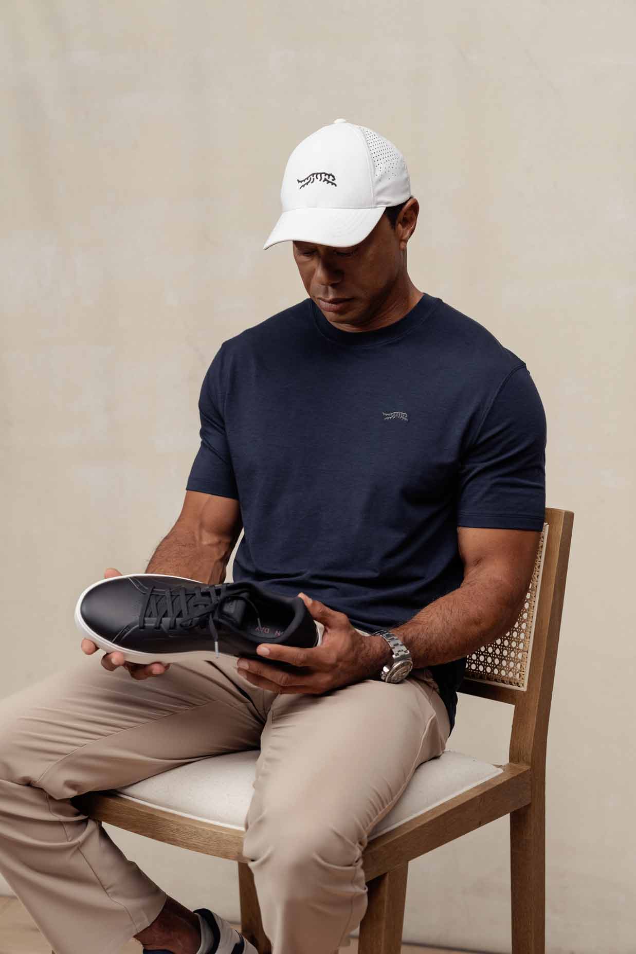 Tiger Woods with the Sun Day Red Osprey.