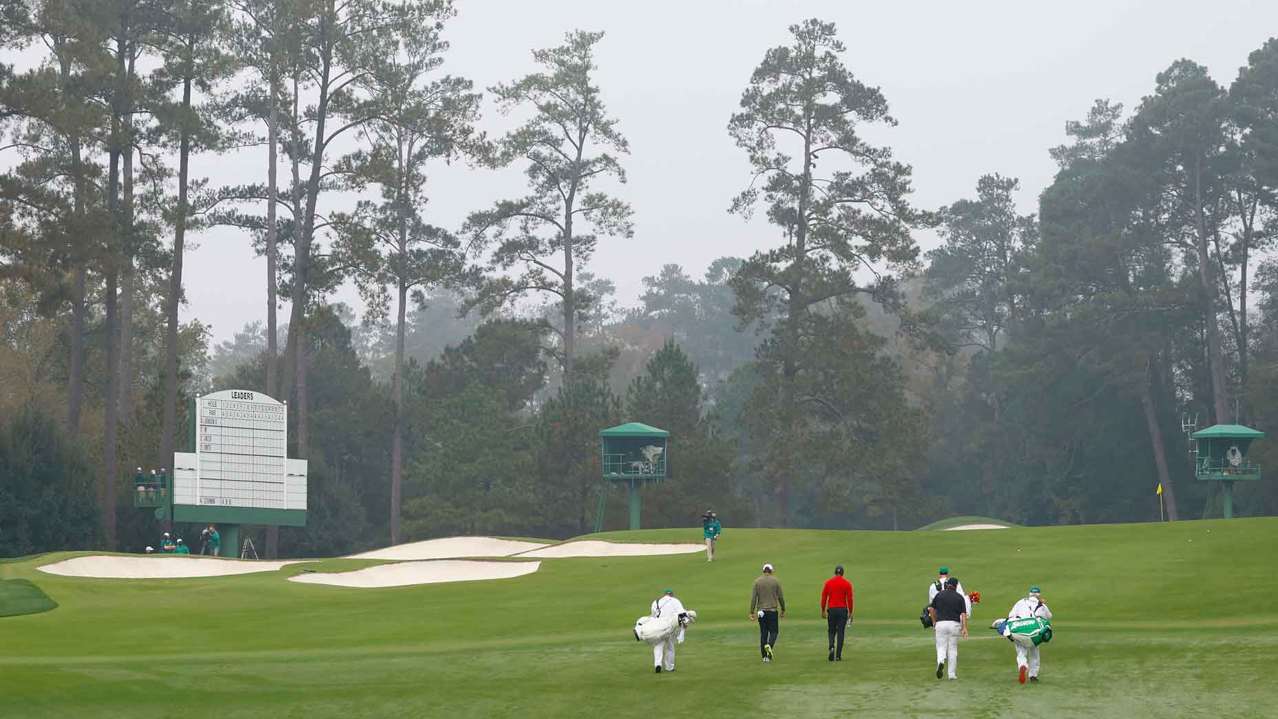 Tiger Woods, Scottie Scheffler and Shane Lowry at the 2020 Masters.