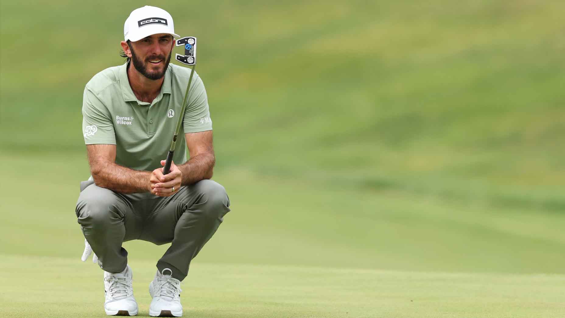 Max Homa lines up a putt during the final round of the John Deere Classic.