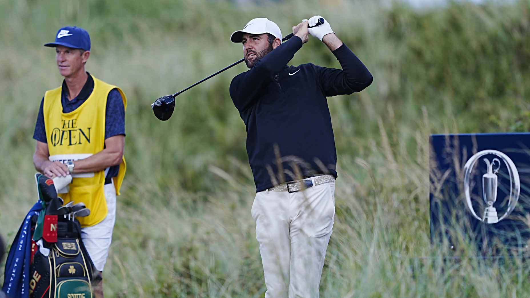 Scottie Scheffler hits tee shot at the 2025 Open Championship at Royal Portrush.