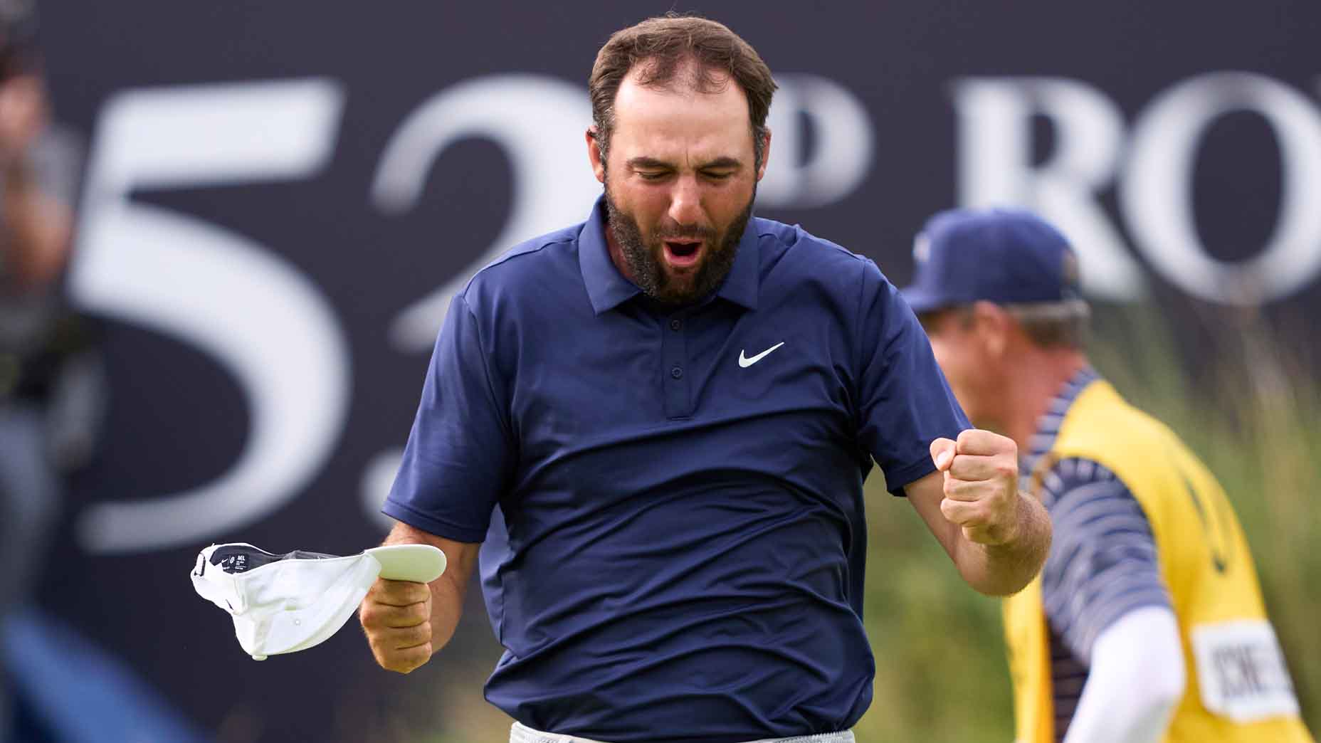Scottie Scheffler celebrates after winning the 2025 Open Championship