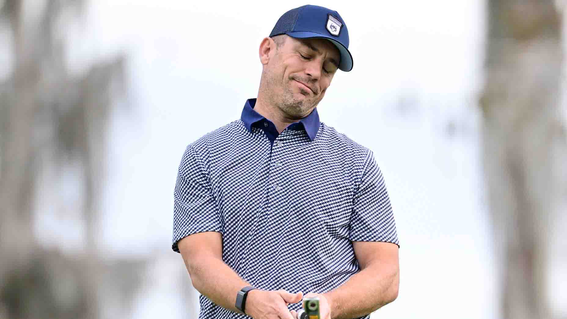 Taylor Twellman reacts to a missed putt