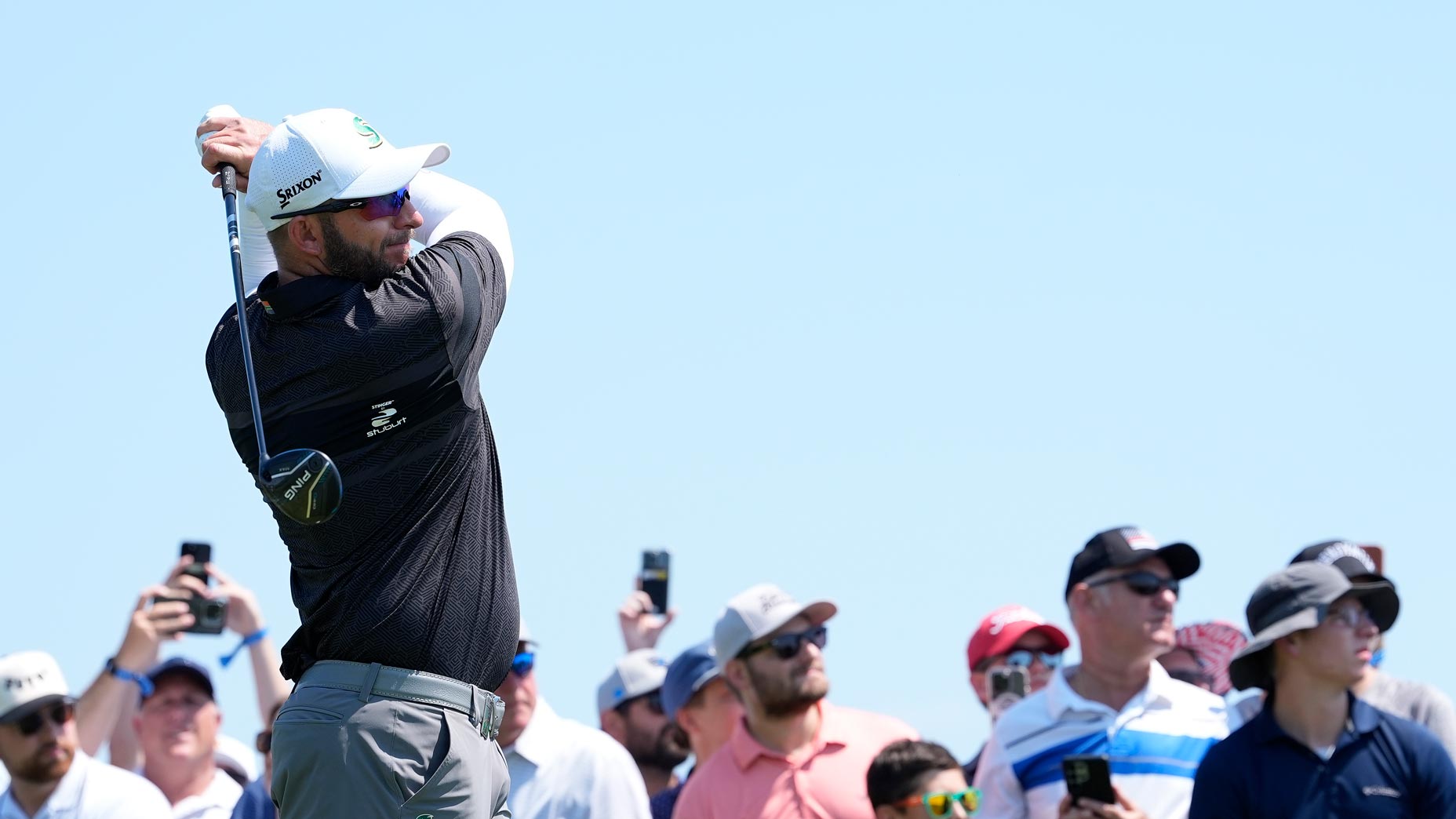 Dean Burmester hits a tee shot during the final day of LIV Chicago