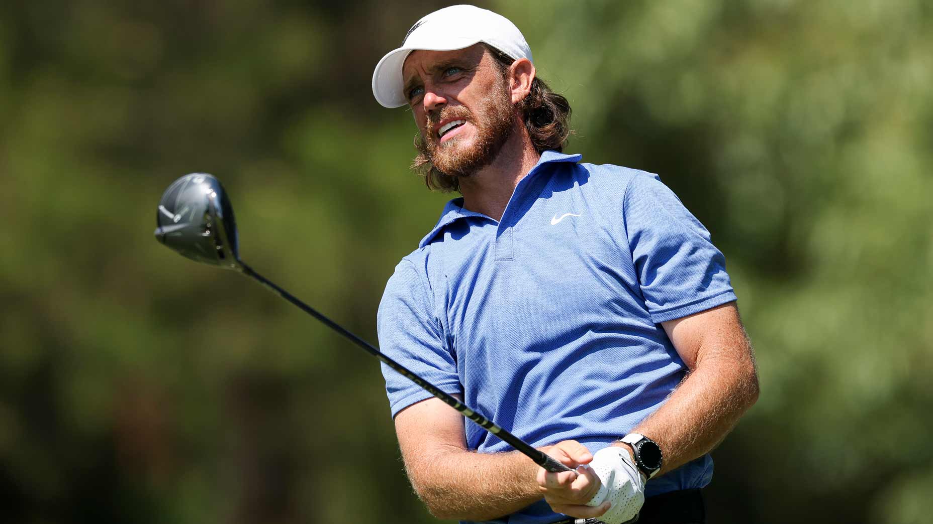 Tommy Fleetwood of England watches a tee shot on the seventh hole during the second round of the FedEx St. Jude Championship 2025 at TPC Southwind on August 08, 2025 in Memphis, Tennessee.