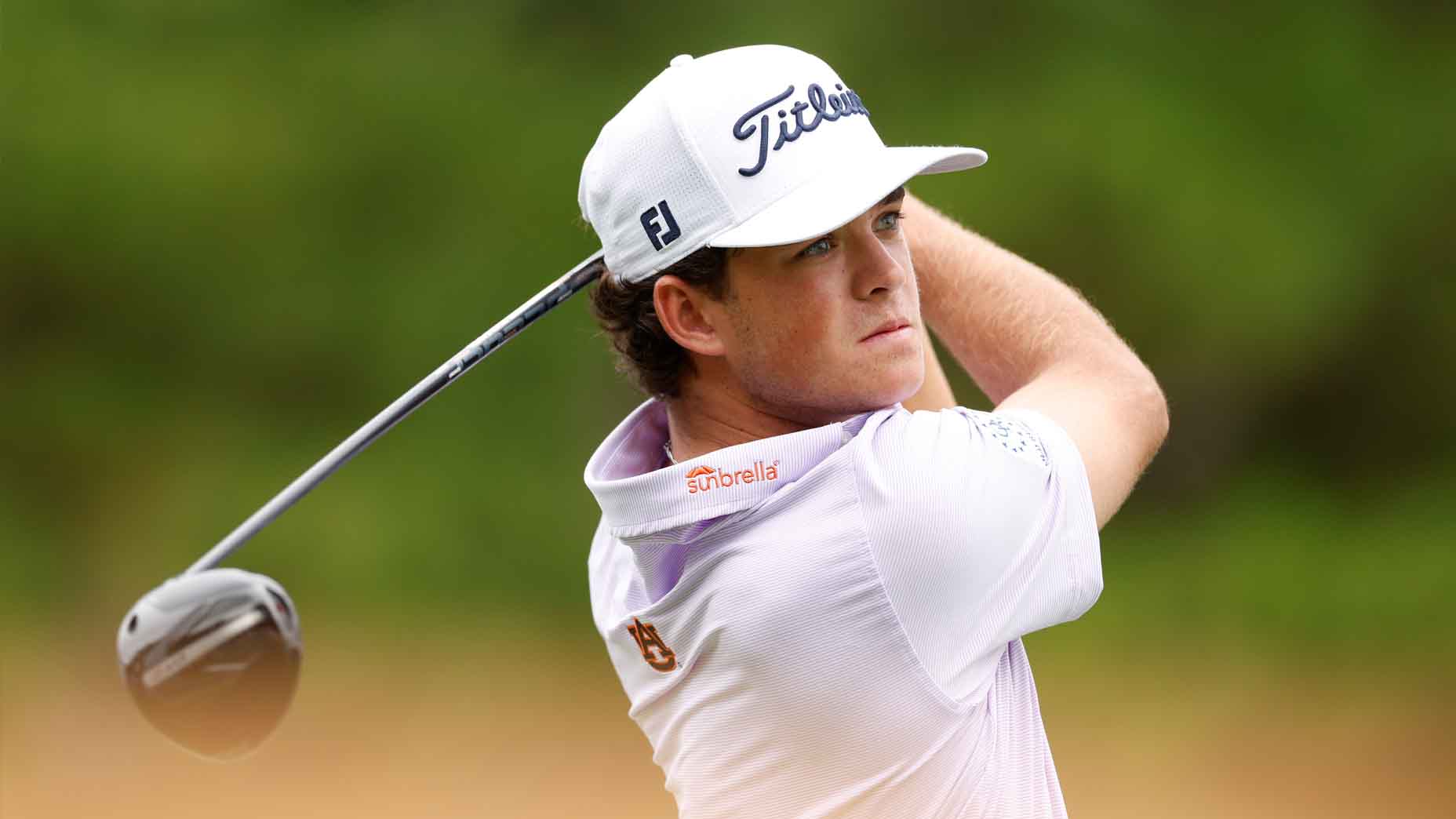 Jackson Koivun hits a tee shot at the Wyndham Championship