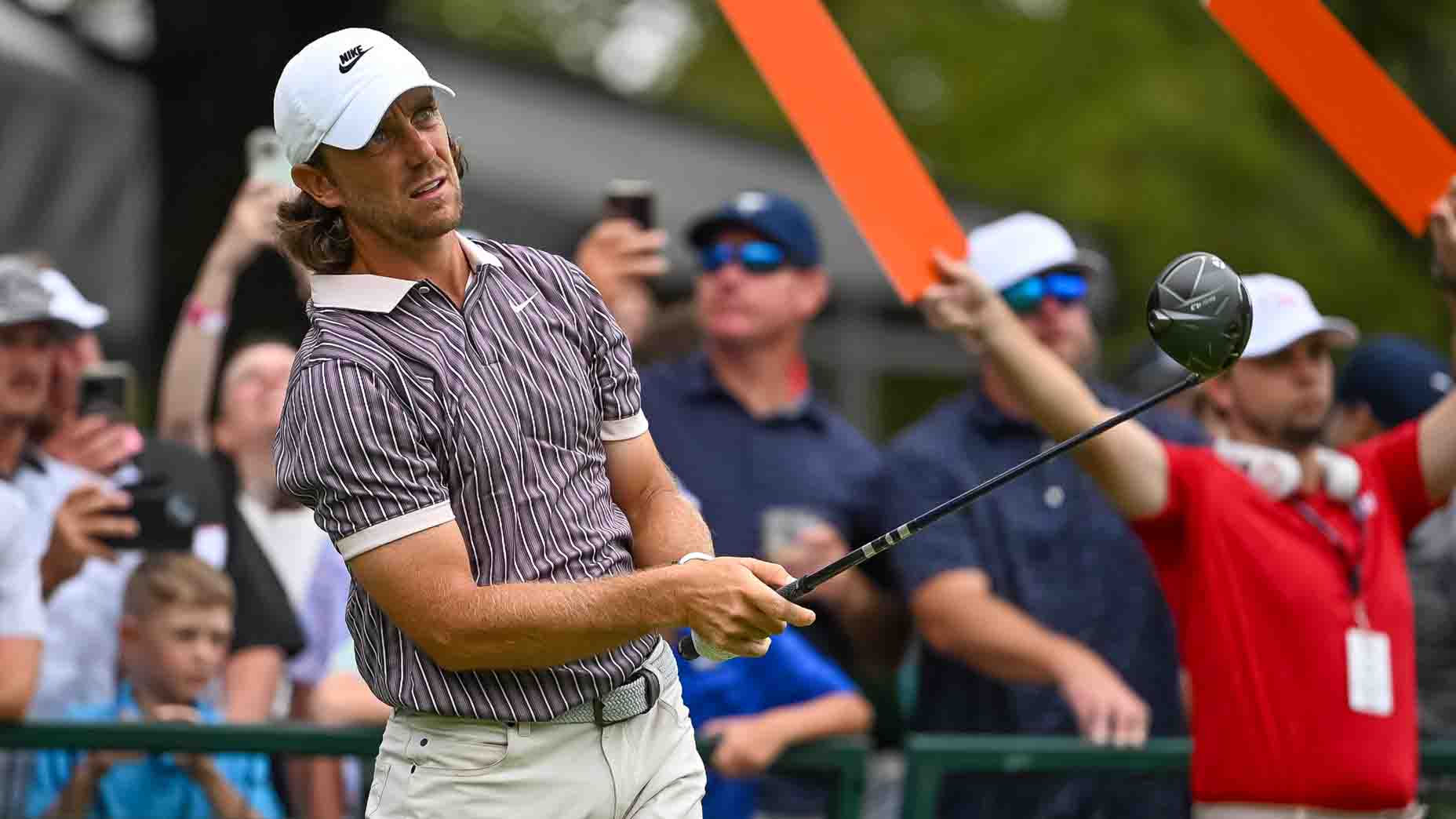 Tommy Fleetwood watches his tee shot at the Tour Championship