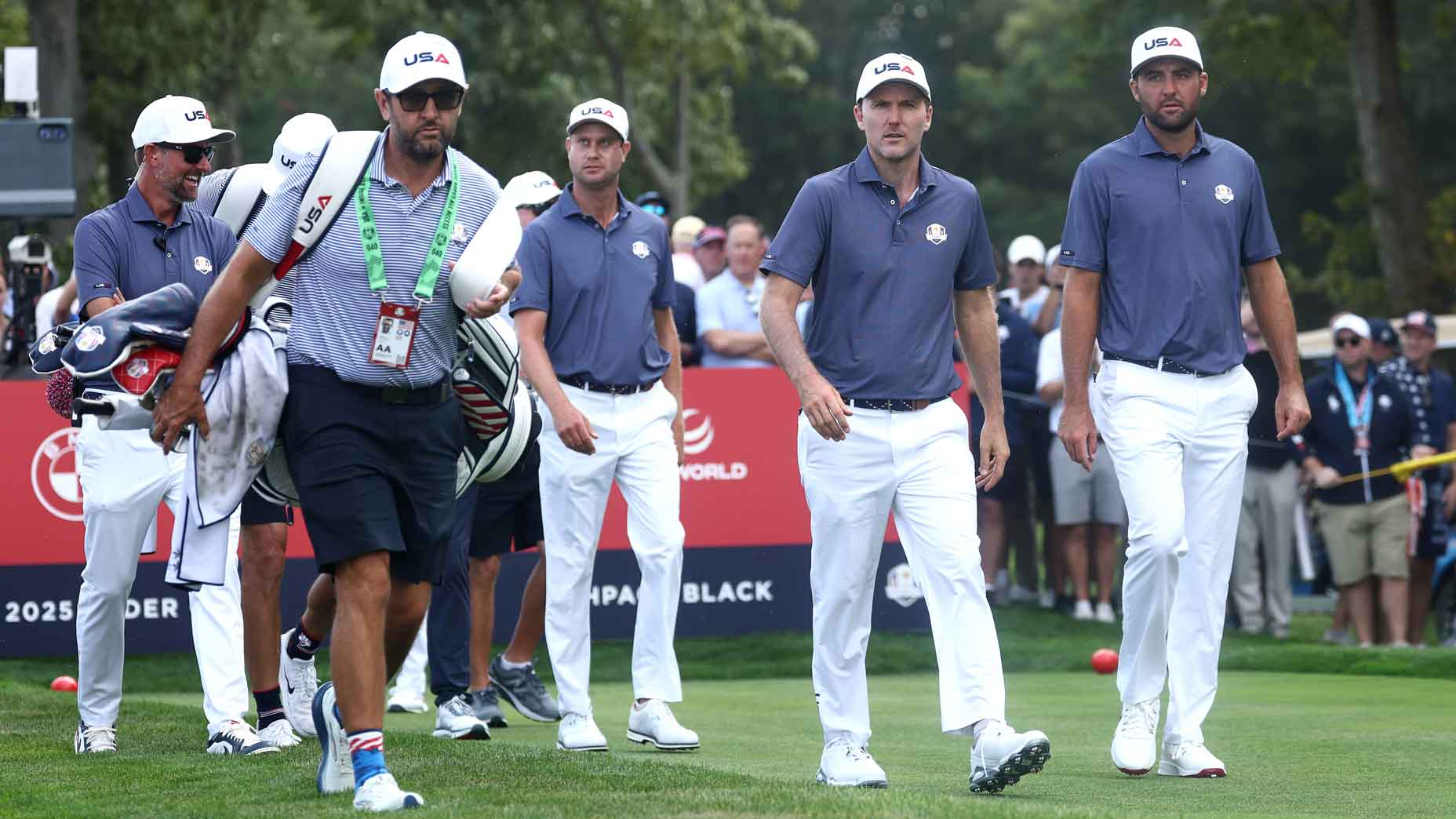 Russell Henley of Team United States and Scottie Scheffler of Team United States look on while playing the 12th hole prior to the Ryder Cup 2025 at Black Course at Bethpage State Park Golf Course on September 23, 2025 in Farmingdale, New York