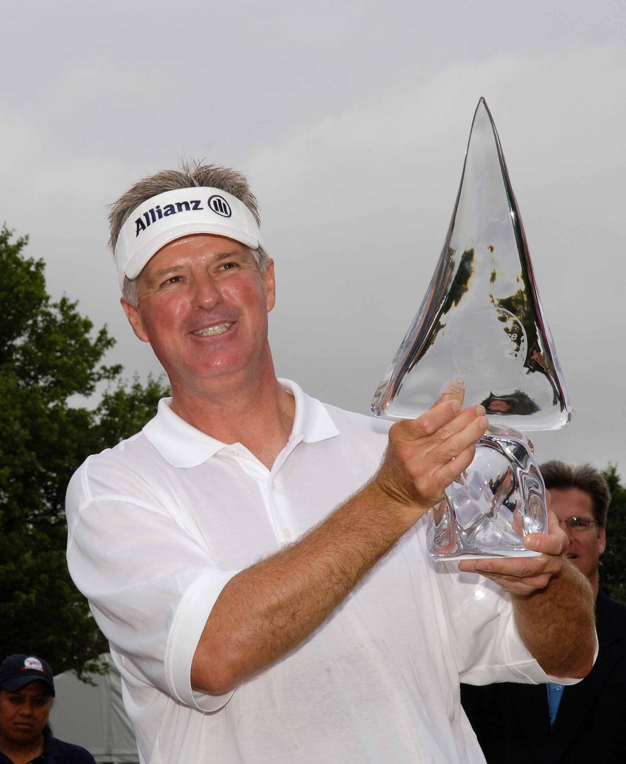John Harris lifts the trophy after winning the Commerce Bank Championship at Eisenhower Park in East Meadow, N.Y., in 2006.