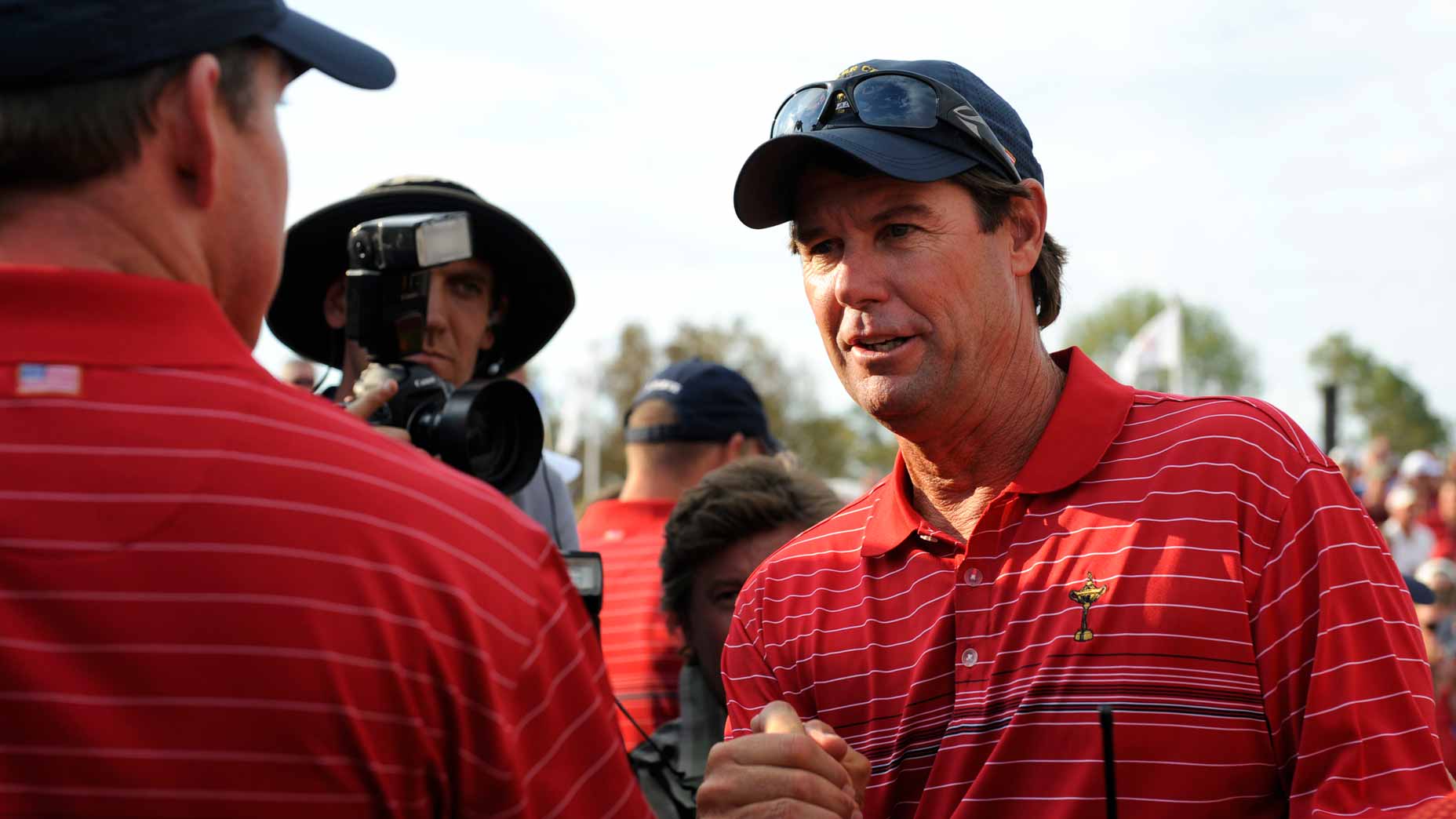 U.S. Ryder Cup captain Paul Azinger greets Justin Leonard at the 2008 Ryder Cup at Valhalla.