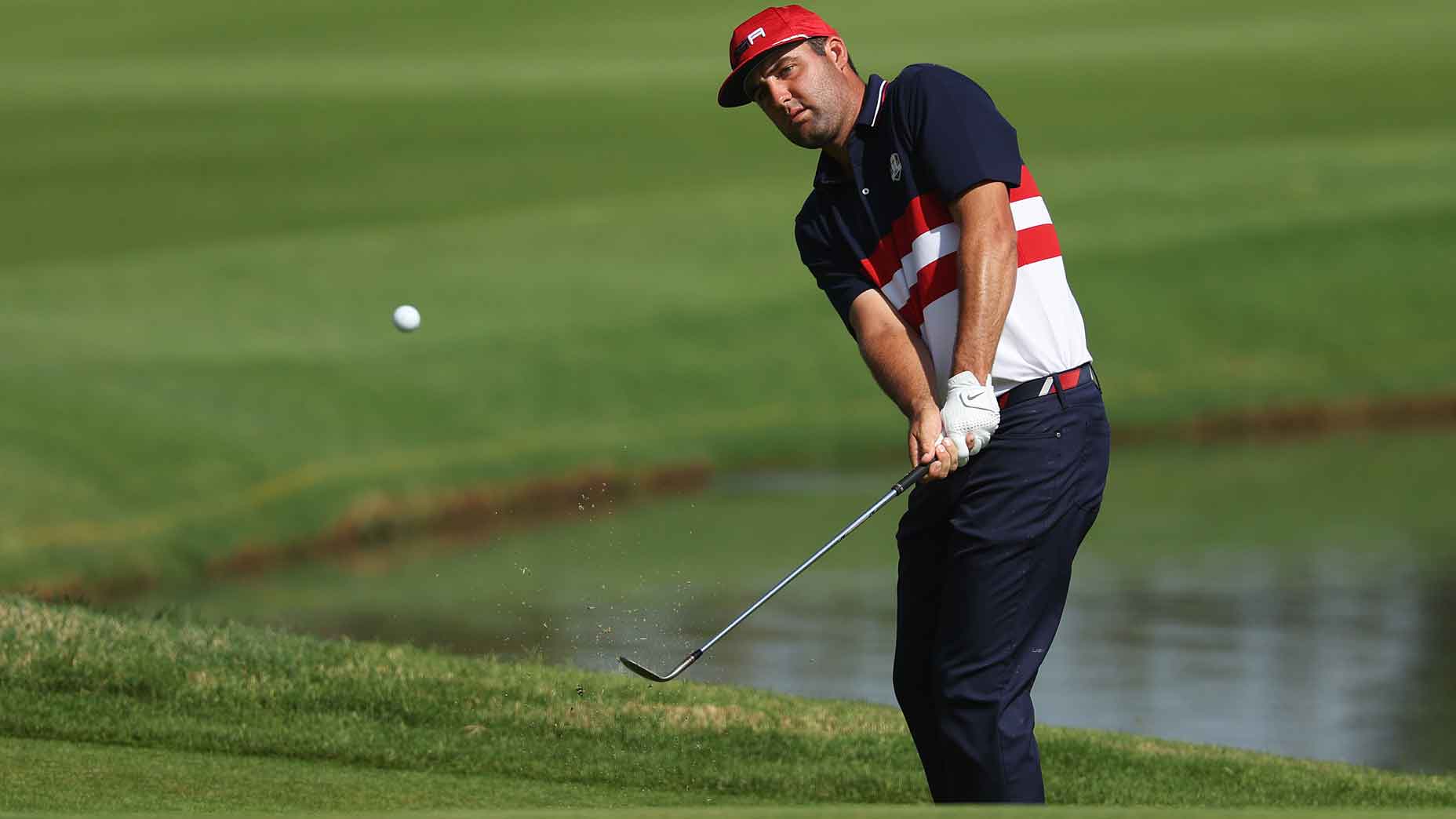 scottie scheffler hits a chip during the 2023 ryder cup