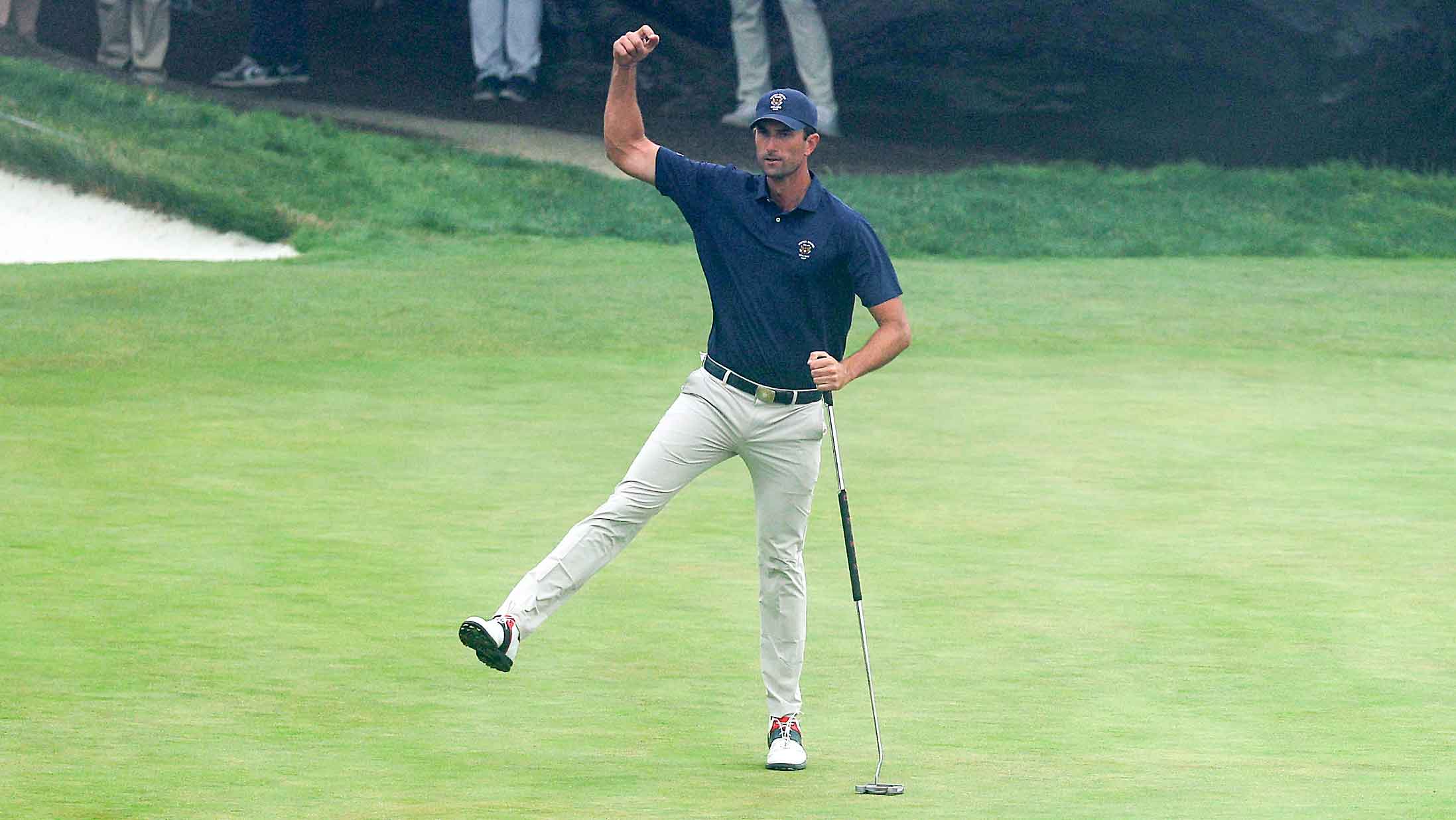 Stewart Hagestad of The United States team holes a birdie putt on the 15th green to defeat Eliot Baker of The GB&I team by 4&3 to ensure The United States retained the Walker Cup