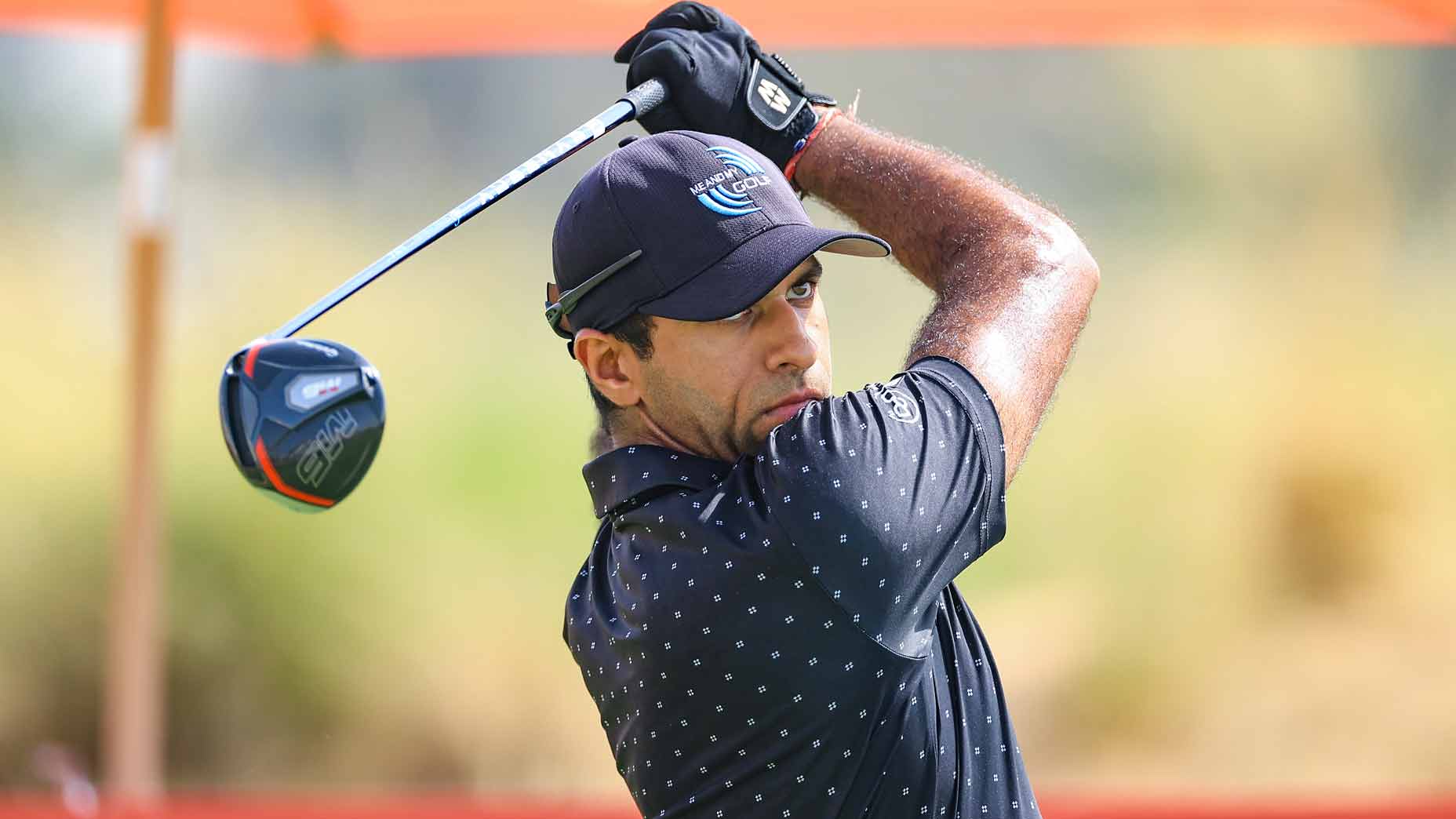Aaron Rai, who made an albatross on Fridau, plays a tee shot during the third round of the 2025 Abu Dhabi HSBC Championship.
