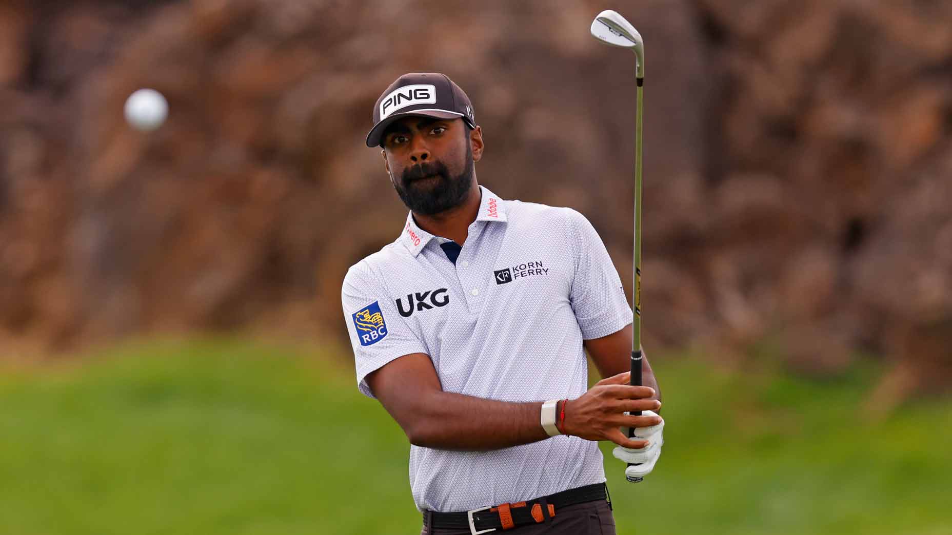 Sahith Theegala chips during PGA Tour's 2025 Bank of Utah Championship.