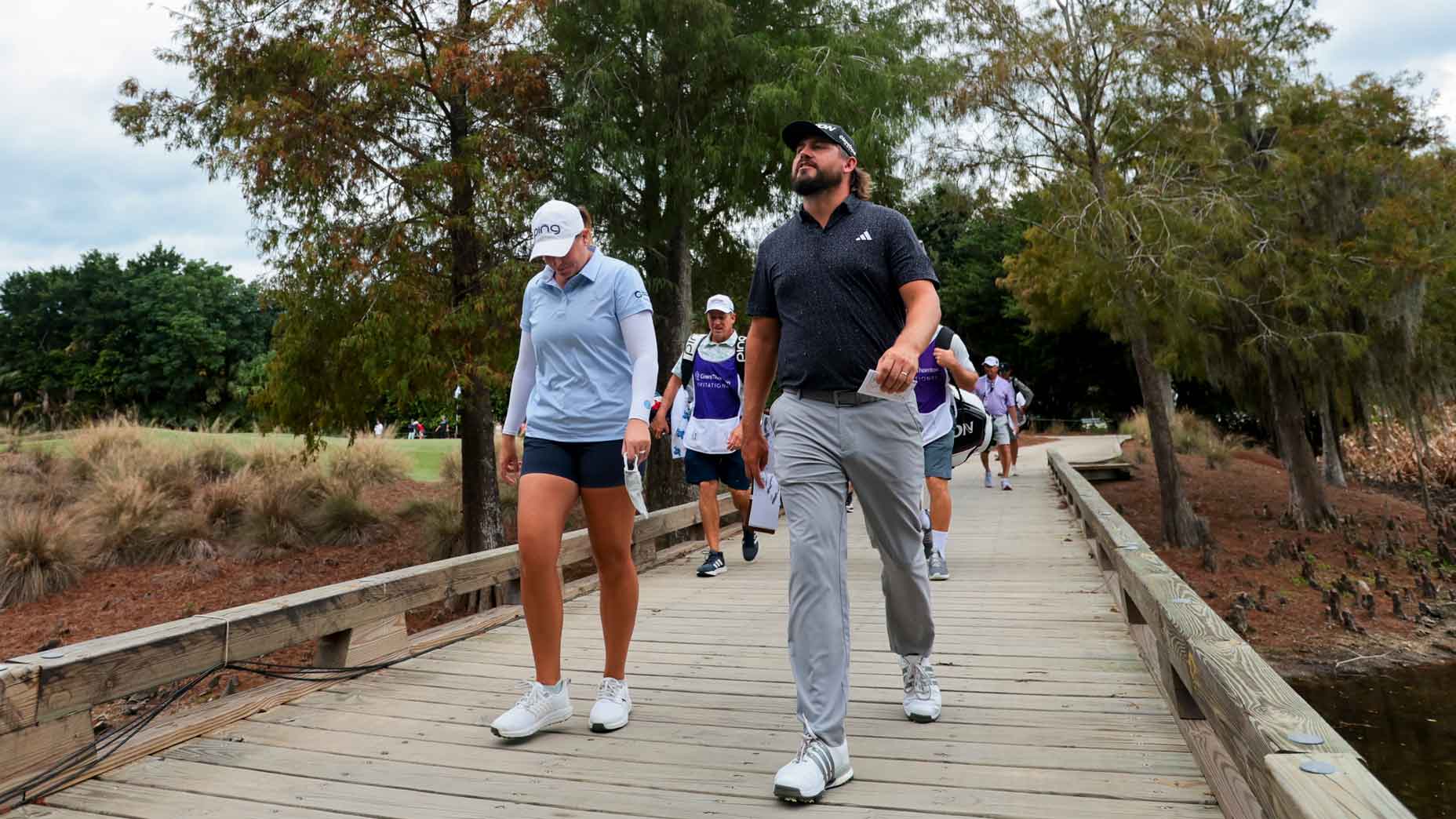 Lauren Coughlin and Andrew Novak walk during the second round of the 2025 Grant Thornton Invitational.
