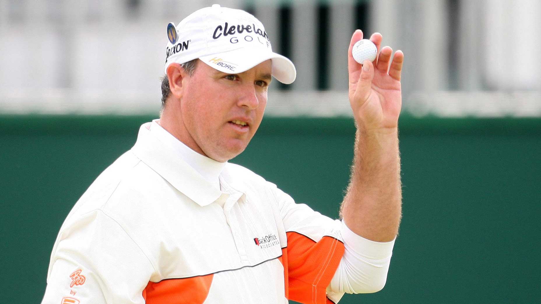 PGA Tour pro Boo Weekley waves to fans during the 2009 Open Championship at Turnberry.