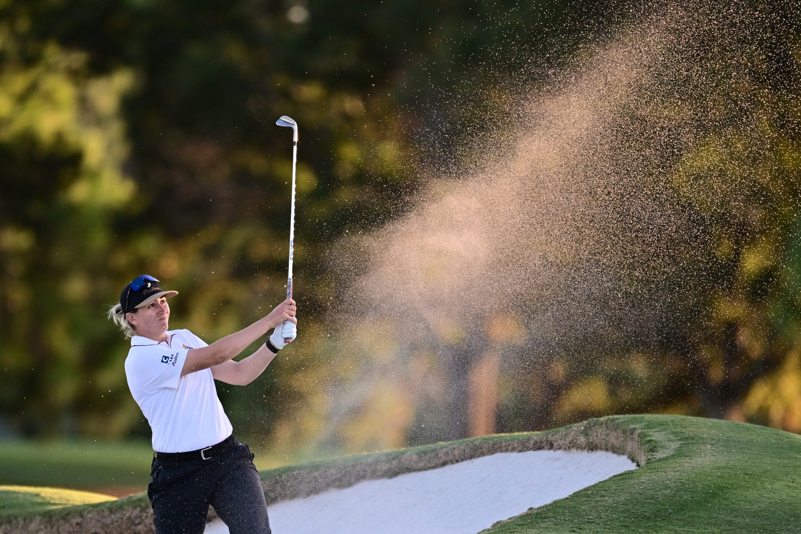 Gigi Stoll hits a bunker shot at the 2025 ANNIKA